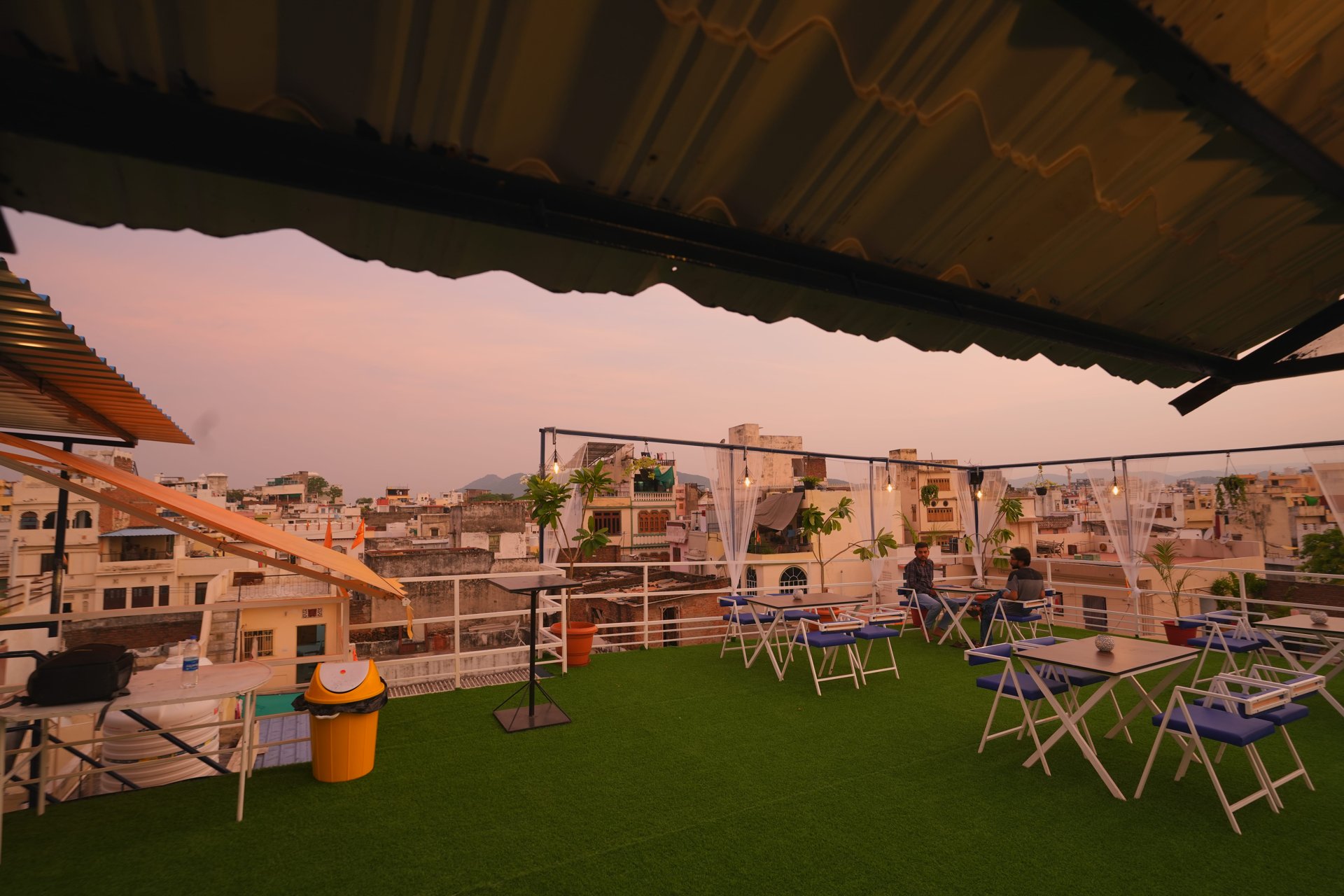 Golden hour over Udaipur's lake and palaces